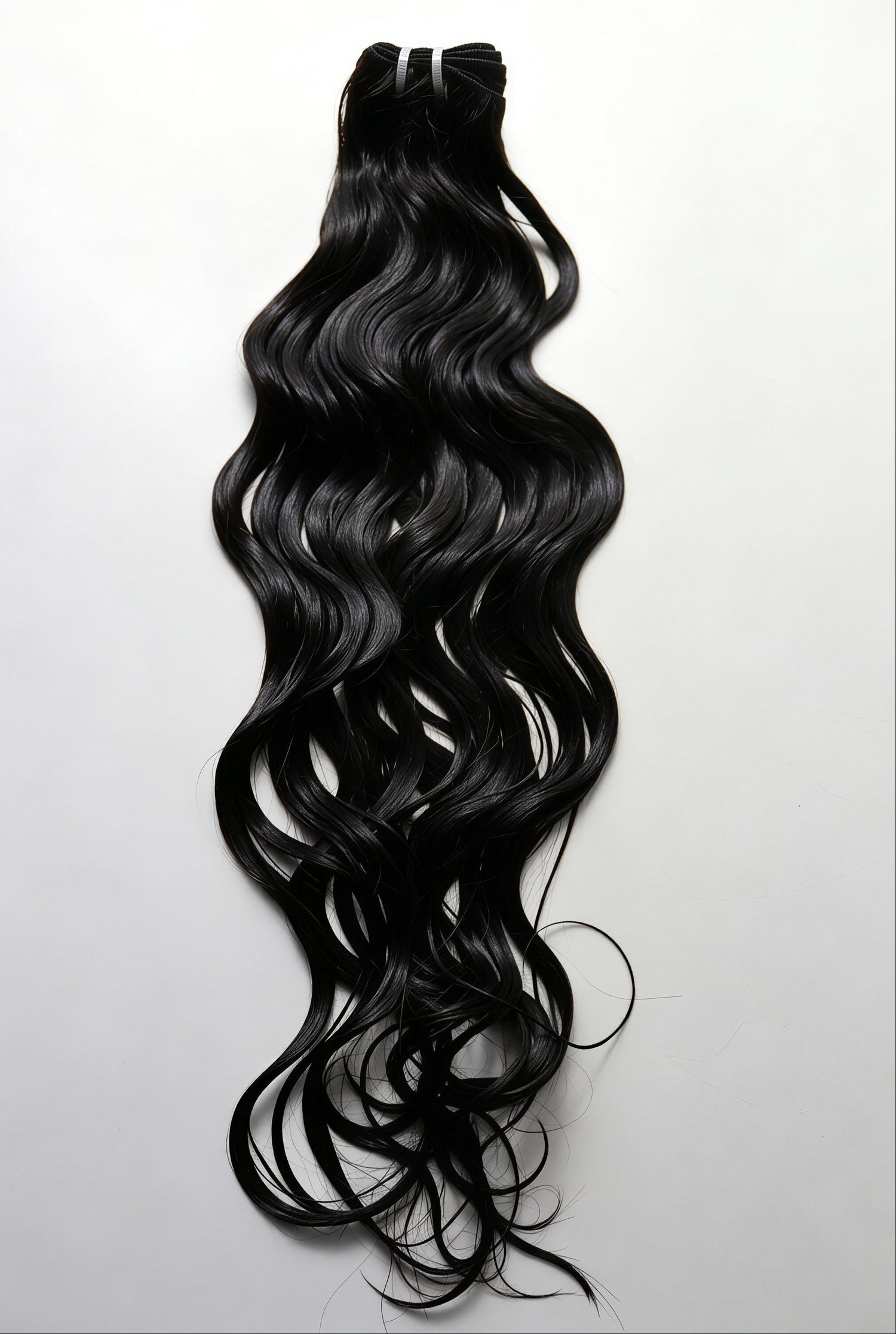 Raw hair in wet state, showcasing natural texture and density